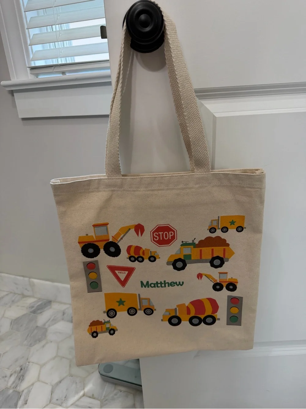 Personalized “Matthew” Kids Canvas Toy Bag - Cream with Yellow & Orange Trucks